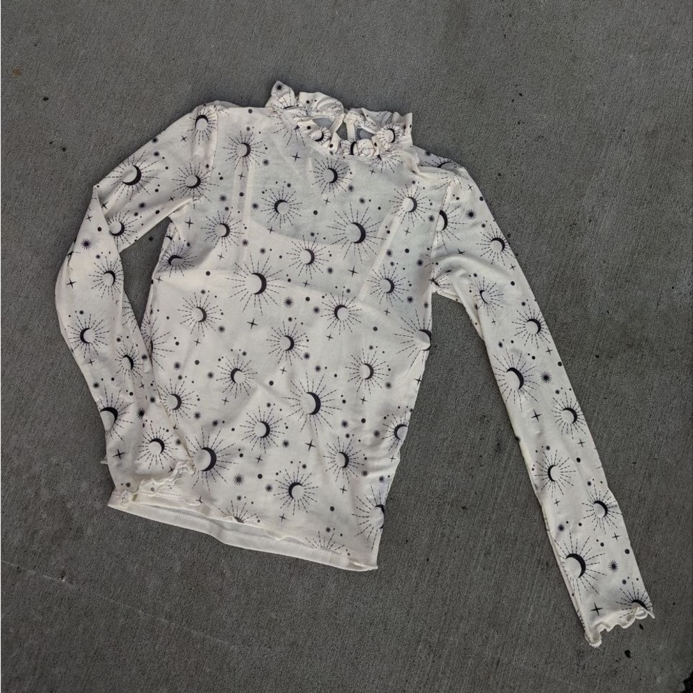 Women's turtleneck with a moon print